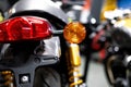 Close up of the rear of a brand new clasic motorcycle, soft focus, abstract background - Image