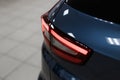 Close-up of the rear light of a modern car. Led optics of the car. Detail on the rear light of a car. Car detail. Royalty Free Stock Photo