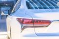 Close-up of rear light of modern white car Royalty Free Stock Photo