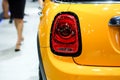 Close up rear light of yellow sports car