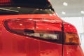 Close up of rear lights detail of modern luxury car with projector lens for low and high beam. Front view of sport Royalty Free Stock Photo