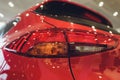 Close up of rear lights detail of modern luxury car with projector lens for low and high beam. Front view of sport Royalty Free Stock Photo