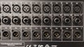 Close up of microphone inputs on a music mixer Royalty Free Stock Photo