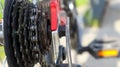 Close-up of a rear set of gear shifting sprockets on the rear wheel of a modern mountain bike with chain. Bicycle repair Royalty Free Stock Photo