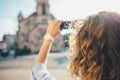 Close-up rear view curly hair head of young woman