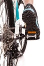 Close up rear view cyclist pedalling bike Royalty Free Stock Photo