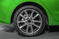 Close up rear wheel right of a Green car, Rear Wheel Driv Royalty Free Stock Photo