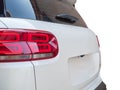 A partial close-up of the rear taillights of a white Citroen C5 aircross SUV