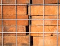 Close up of reclaimed bricks stacked in a metal cage