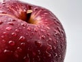 Close up red apple water drops isolated Royalty Free Stock Photo