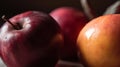 a close up of a red apple and a yellow apple on a table with a black background and a blurry image of the apple Royalty Free Stock Photo