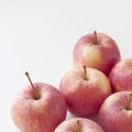 Close-up of red apples fresh and juicy on a white background. Royalty Free Stock Photo