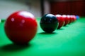 Close up of red and black balls on Snooker table Royalty Free Stock Photo
