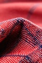Close-up of red and blue plaid fabric with detailed texture and patterns Royalty Free Stock Photo