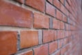 Close-up of a red brick wall background of a cafe Royalty Free Stock Photo
