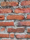 close up Red Brick Wall with with cement and sand Royalty Free Stock Photo