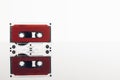 Close up of red cassette tape on white background with reflection Royalty Free Stock Photo