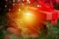 Close up on red christmas box gift, magicial effect Royalty Free Stock Photo