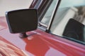 Close-up of red classic car side-view Mirror Royalty Free Stock Photo