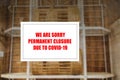 Close-up on a red closed sign in the window of a shop displaying the message Royalty Free Stock Photo