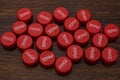 Close-up of red coca cola caps