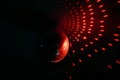 Close up of a red disco ball in a club.Disco ball in club lighting up the room Royalty Free Stock Photo