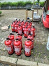 Close-up of red fire extinguishers lined up for inspection Royalty Free Stock Photo