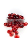 Red gel medical capsules, isolated on white background Royalty Free Stock Photo