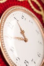 Close-up of red and gold antique tambour clock Royalty Free Stock Photo