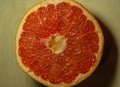 Close-up of a red grapefruit cut in half Royalty Free Stock Photo