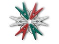 close up red, green, and white plastic clothespins Royalty Free Stock Photo
