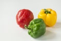 Close up of red, green, yellow bell peppers. Royalty Free Stock Photo