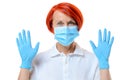 Close up of red headed nurse wearing face mask