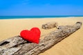 Close up red hearts on ocean beach sand - love concept for holidays Royalty Free Stock Photo