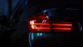 Close-up of a red led taillight on a modern car, detail on the rear light of a car. Royalty Free Stock Photo