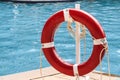 Close up of red life ring at the pool Royalty Free Stock Photo