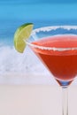 Close up red Martini cocktail on the beach Royalty Free Stock Photo