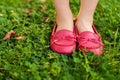 Close up of red moccasins on child's feet Royalty Free Stock Photo