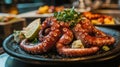 Close Up Red Octopus Dish with Lime and Herbs Royalty Free Stock Photo