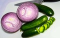 Slicing Red Onion and Green Cucumbers