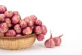 Close up red onion or shallots in wooden basket