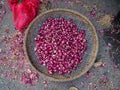 Close up of a red onions insid eof a wooden tray in a street market in Hue, Vietnam