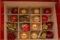 Close up red open box of Christmas decorations-2 Royalty Free Stock Photo