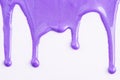 Close up of red paint drops on white paper background. Red nail polish. Sample of makeup in lavender color Royalty Free Stock Photo