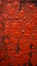 a close up of a red paint splattered wall