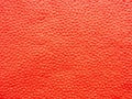 Close-up of red paper napkin, scarlet abstract textured background