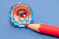 Close up of red pencil and a blue pencil shaving Royalty Free Stock Photo