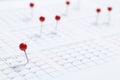 Close up of red pin on calendar at home office, date planning for business meeting or appointment, Royalty Free Stock Photo