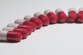 Close up of red and pink probiotics capsule