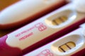 Close up of red positive pregnancy tests Royalty Free Stock Photo